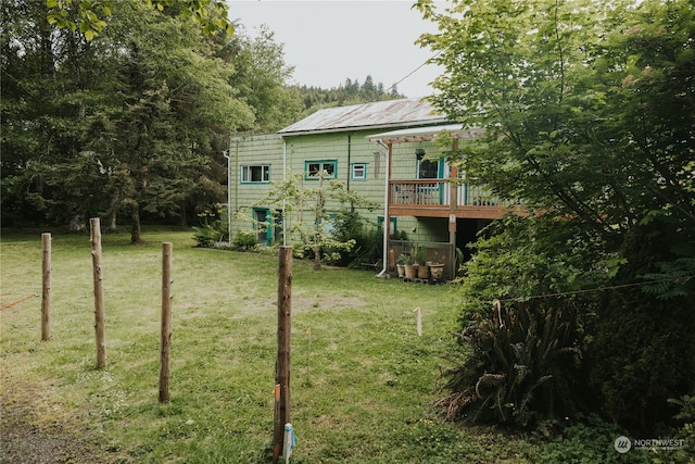 view of yard featuring a wooden deck