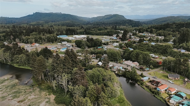 bird's eye view featuring a water and mountain view