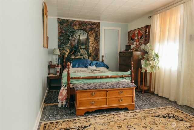 carpeted bedroom with ornamental molding