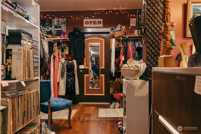 spacious closet with hardwood / wood-style floors