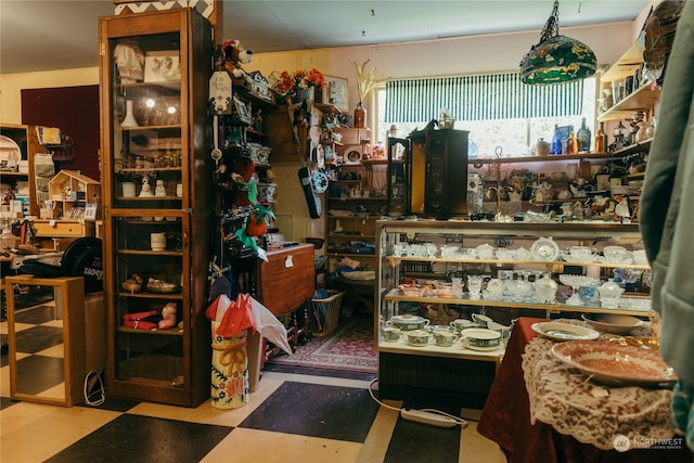 miscellaneous room with tile patterned flooring