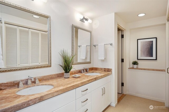 bathroom featuring double sink vanity