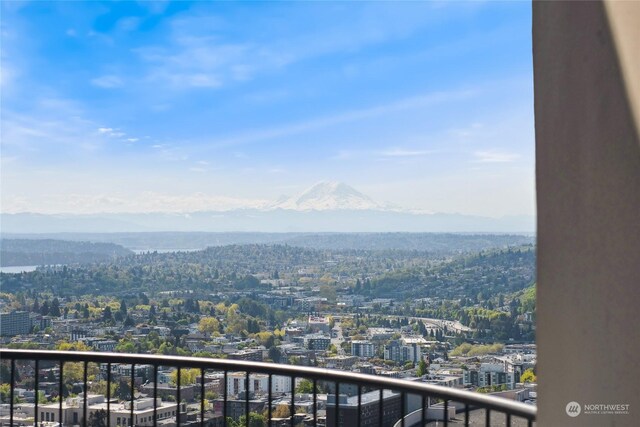 balcony featuring a mountain view