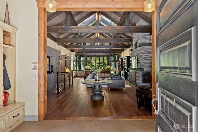 interior space featuring wood ceiling, hardwood / wood-style flooring, and lofted ceiling with beams