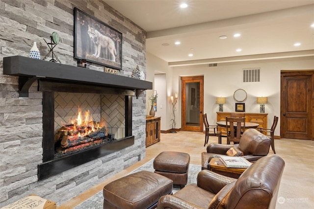 living room featuring a fireplace