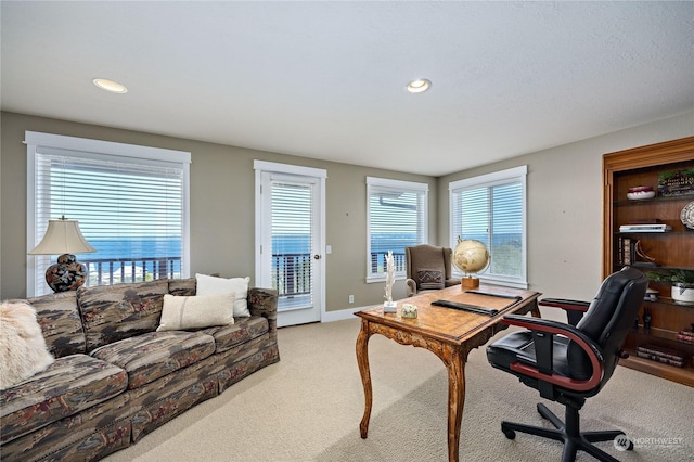 carpeted office with baseboards and recessed lighting