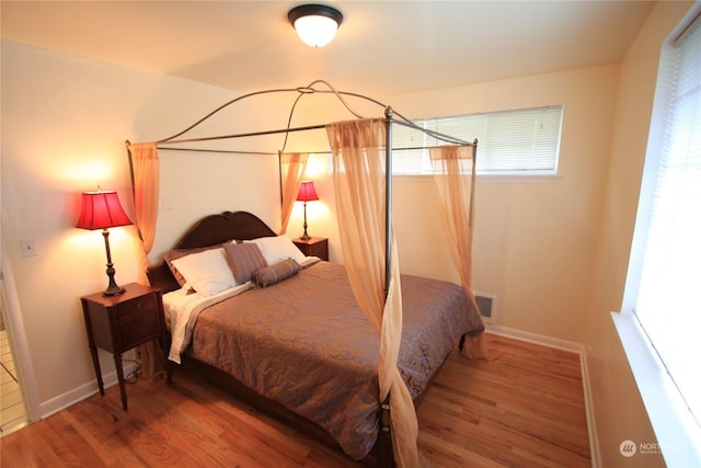 bedroom featuring hardwood / wood-style floors