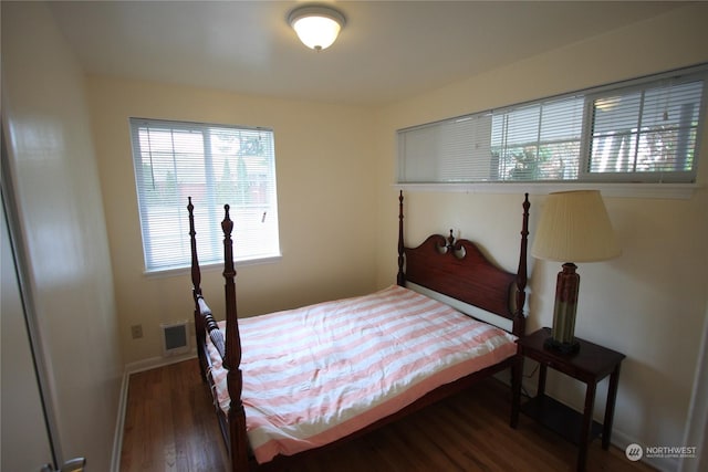 bedroom featuring dark hardwood / wood-style floors