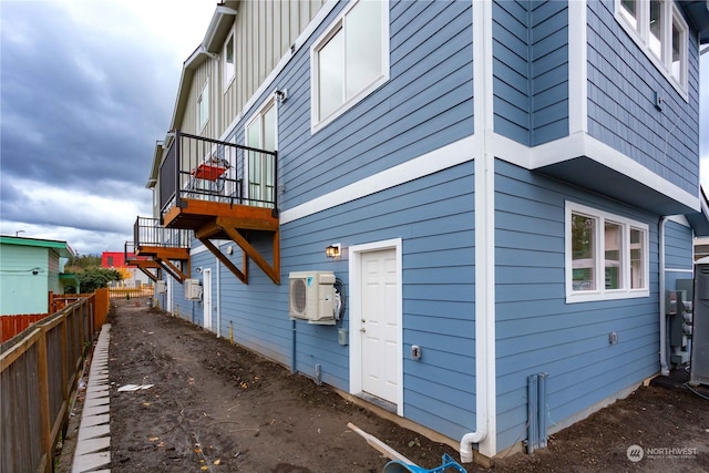 view of home's exterior featuring ac unit