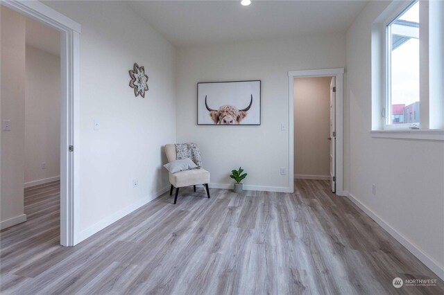 unfurnished room featuring light hardwood / wood-style floors