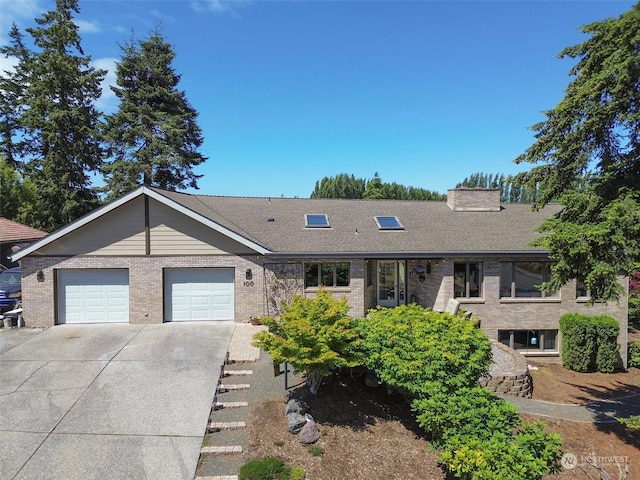 ranch-style house with brick siding, an attached garage, driveway, and roof with shingles