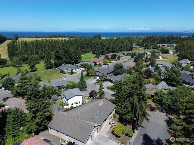 birds eye view of property with a residential view