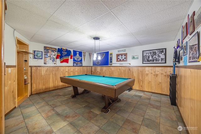 playroom featuring a wainscoted wall, wood walls, pool table, and a paneled ceiling