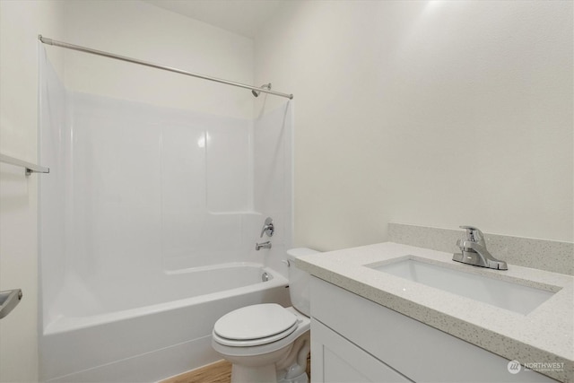full bathroom featuring vanity, shower / washtub combination, and toilet