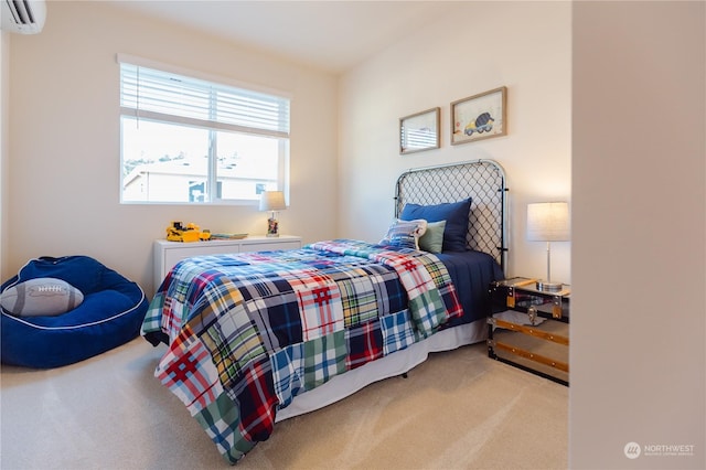 carpeted bedroom with a wall mounted air conditioner