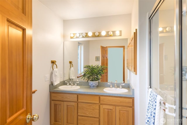 bathroom featuring vanity and walk in shower