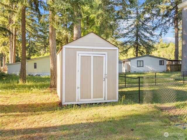 view of outdoor structure featuring a yard