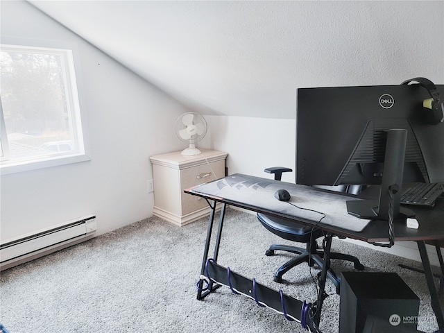 home office featuring lofted ceiling, a baseboard heating unit, and a textured ceiling