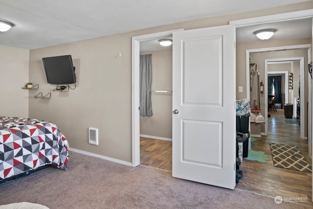 bedroom featuring hardwood / wood-style flooring