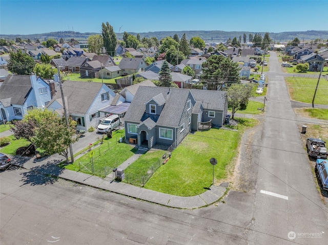 birds eye view of property featuring a mountain view