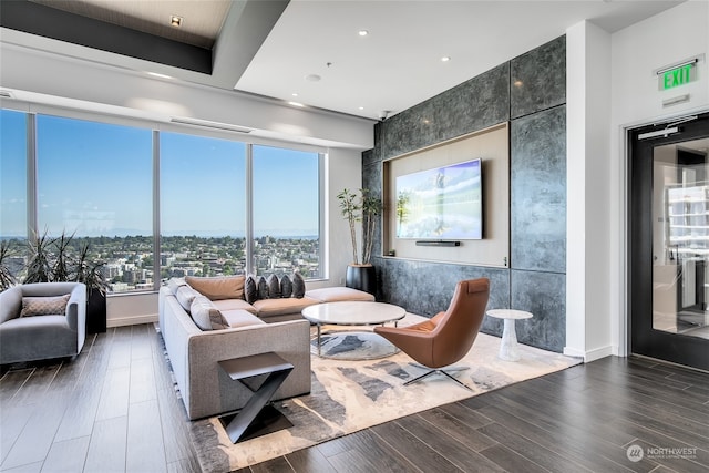 living room with dark hardwood / wood-style flooring