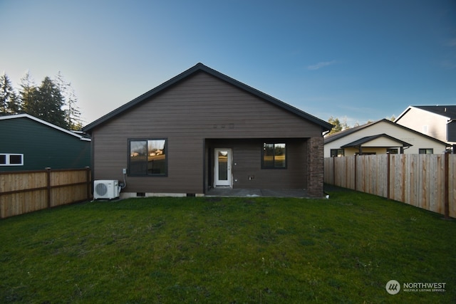 back of house with a patio, ac unit, and a yard