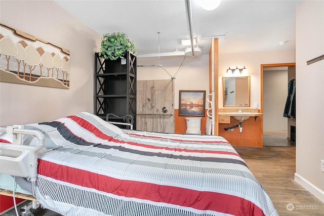 bedroom featuring hardwood / wood-style flooring