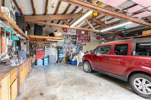 garage featuring a workshop area