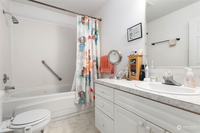 full bathroom with shower / bath combination with curtain, vanity, and toilet