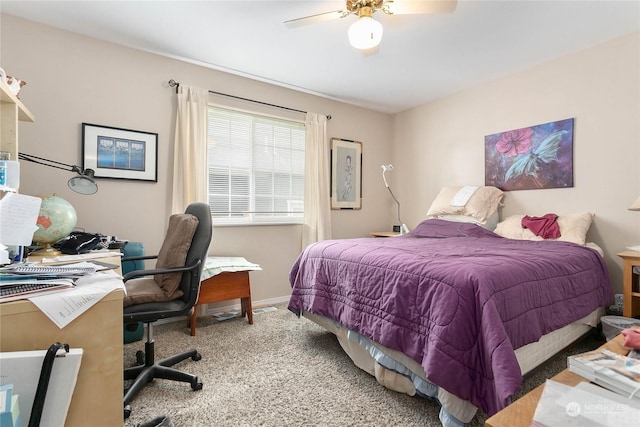 bedroom with ceiling fan and carpet