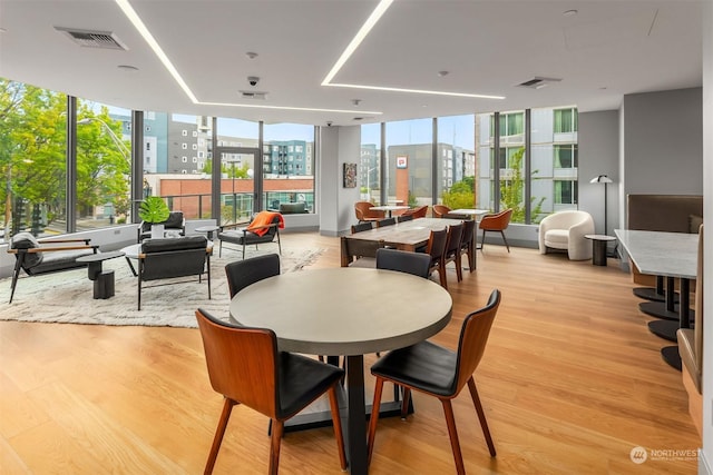 dining room featuring light hardwood / wood-style floors