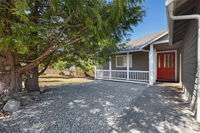 exterior space featuring covered porch