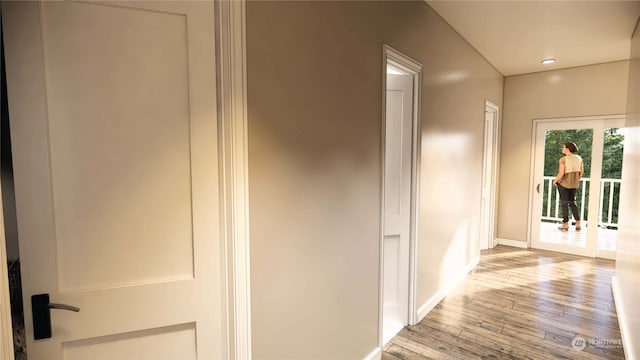 corridor featuring light hardwood / wood-style floors