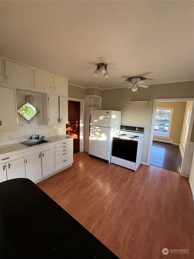 kitchen with ceiling fan, white cabinets, white appliances, light hardwood / wood-style flooring, and backsplash