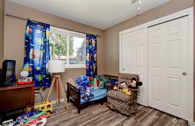 living area featuring hardwood / wood-style floors