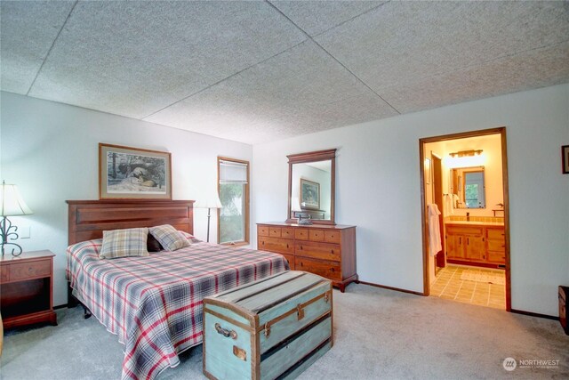 3917 Mallard Point Dr, Anacortes, WA 98221 - bedroom featuring a textured ceiling, carpet flooring, and connected bathroom