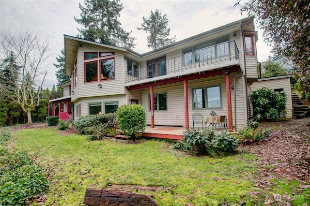 3917 Mallard Point Dr, Anacortes, WA 98221 - back of house with a balcony and a yard