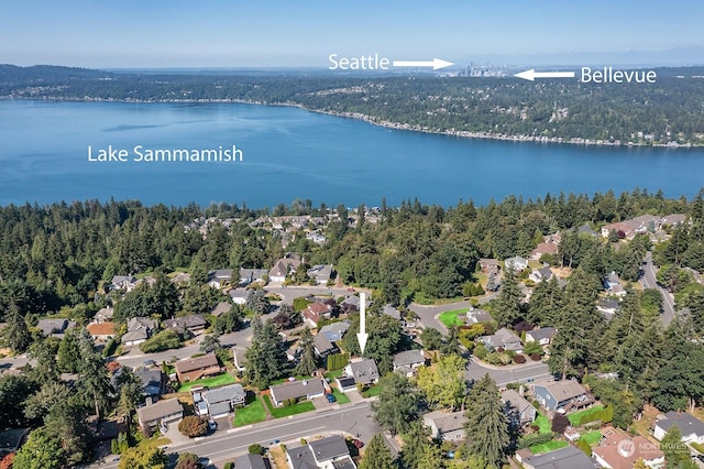 birds eye view of property featuring a water view