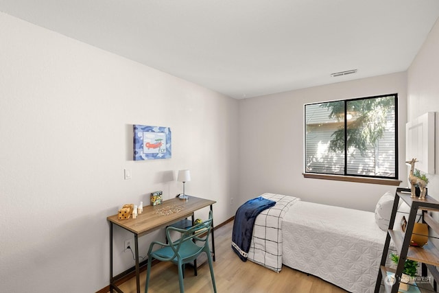 bedroom featuring light hardwood / wood-style flooring