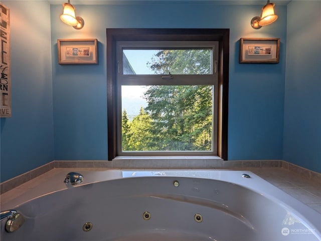 bathroom with a jetted tub