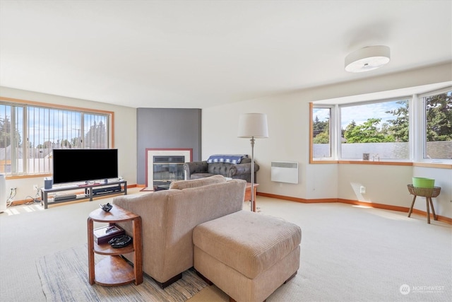 living room with carpet flooring and heating unit