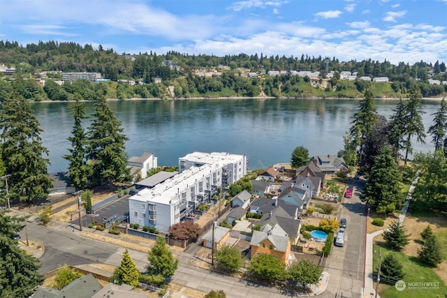 birds eye view of property featuring a water view