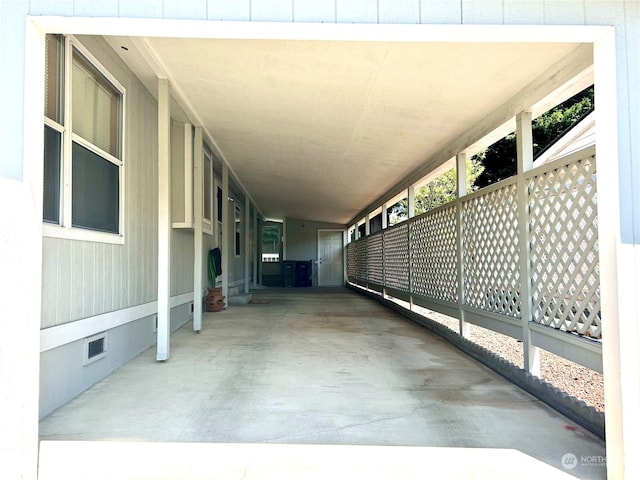 view of patio / terrace featuring a carport