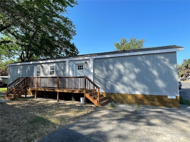 rear view of house with a deck