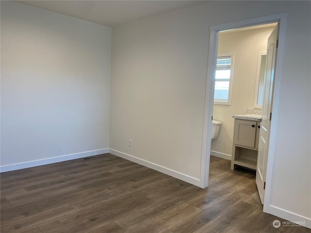 interior space featuring dark hardwood / wood-style flooring