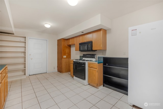 kitchen with built in shelves, white appliances, and light tile patterned floors