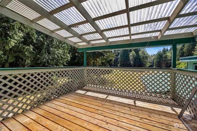 wooden deck featuring a pergola