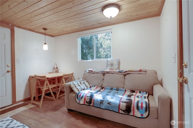 bedroom with wood-type flooring and wooden ceiling