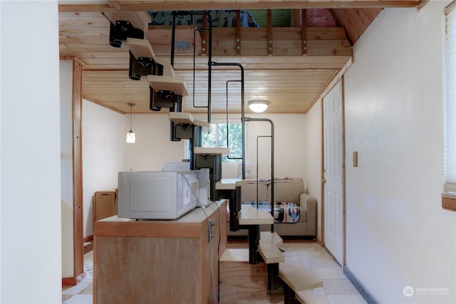 basement featuring wood ceiling