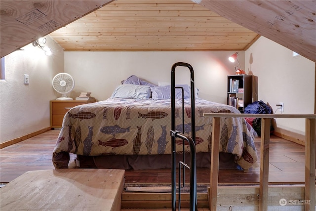 bedroom featuring wood ceiling, vaulted ceiling, and light wood-type flooring